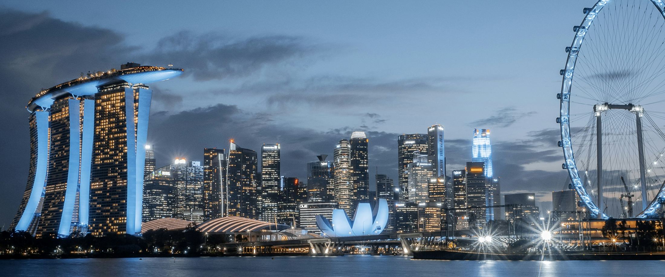 Singapore skyline with Marina Bay Sands and the Singapore Flyer at dusk