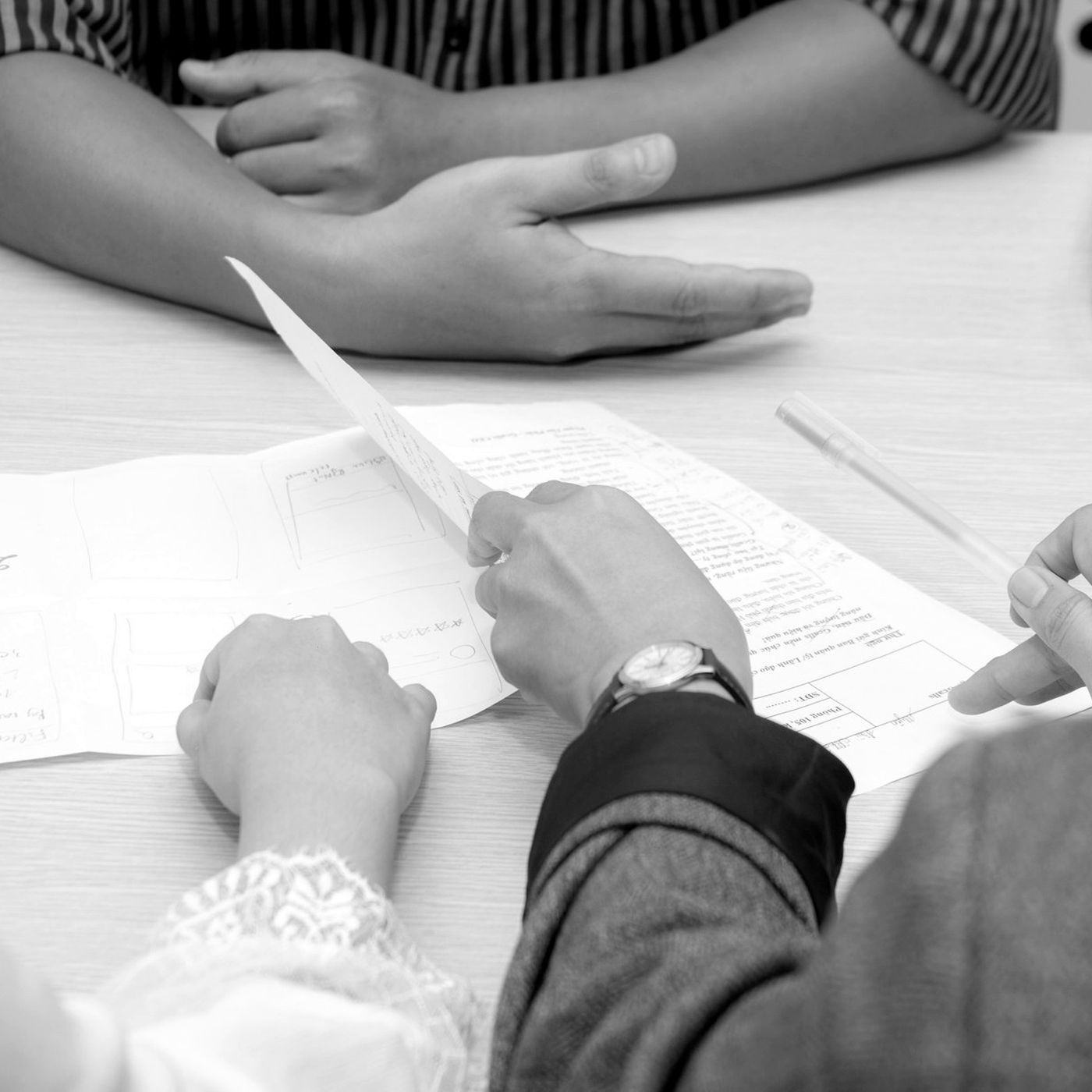 A TRS broker reviewing a policy schedule with a client